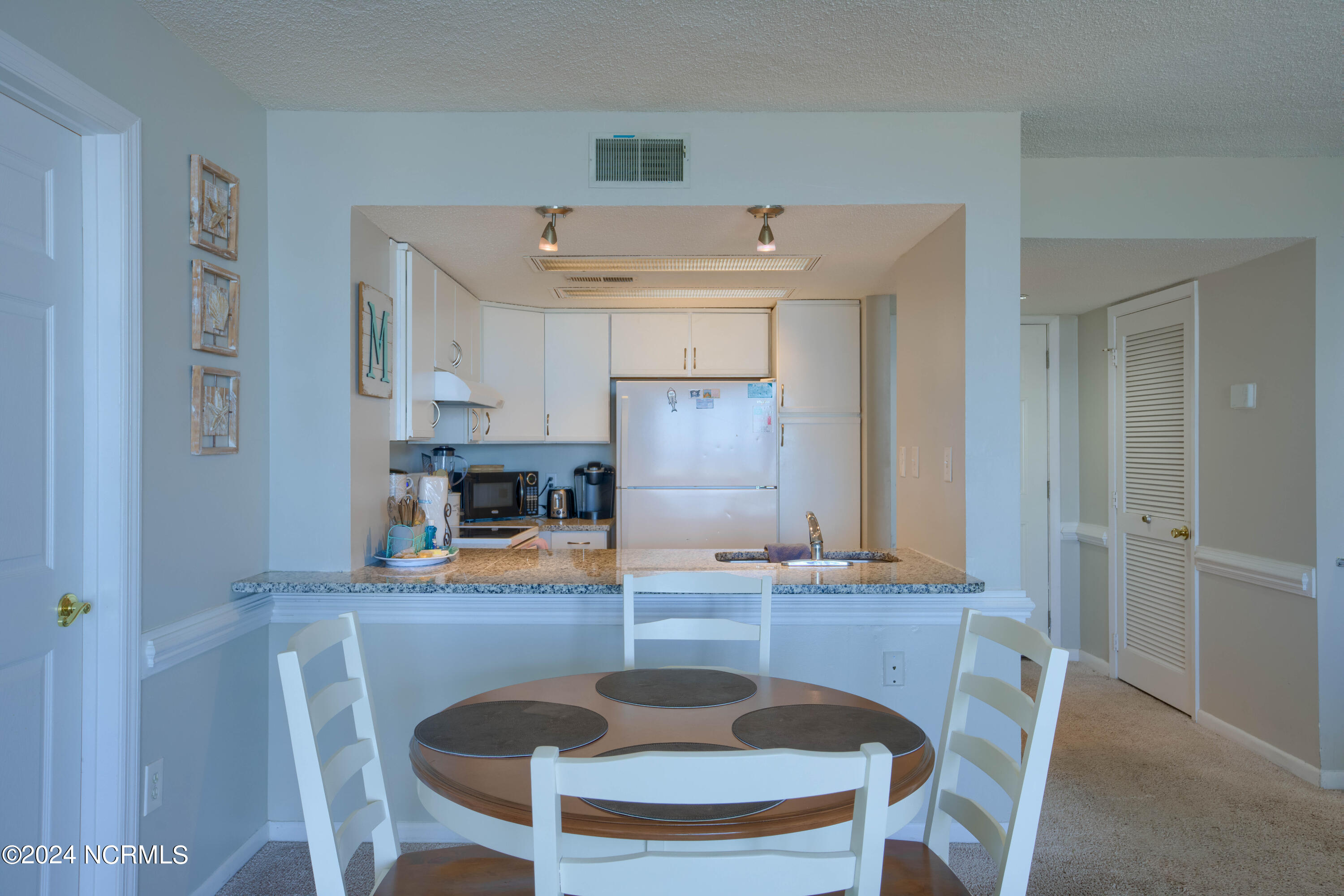 2000 New River Inlet Road, Unit 1305 North Topsail Beach, NC 28460 - Photo 8 of 21 1305 St Regis - Interiors_12