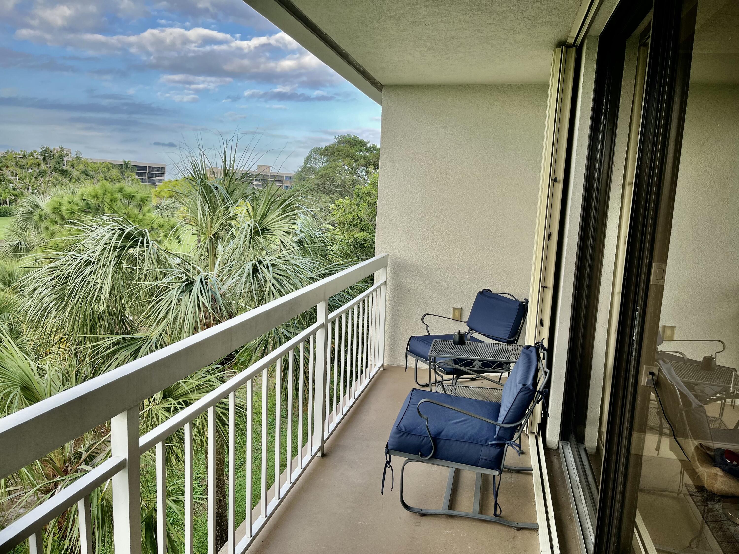 6169 Balboa Circle, Unit 401 Boca Raton, FL 33433 - Photo 29 of 34 a view of balcony with furniture