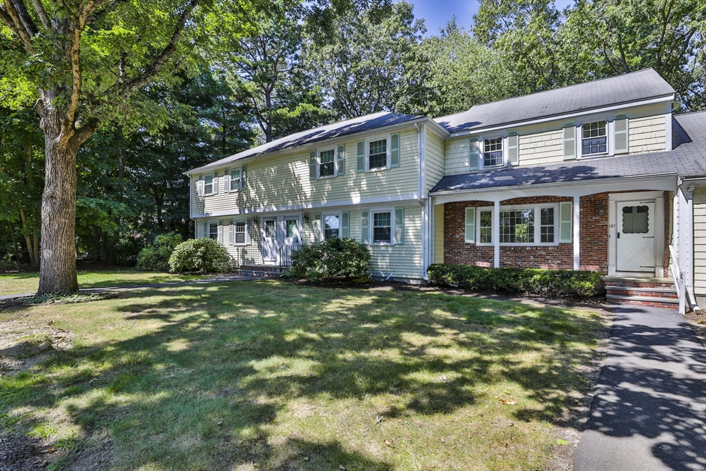 101 Drummer Road, Unit 101 Acton, MA 01720 - Photo 1 of 31 a view of a house with a yard