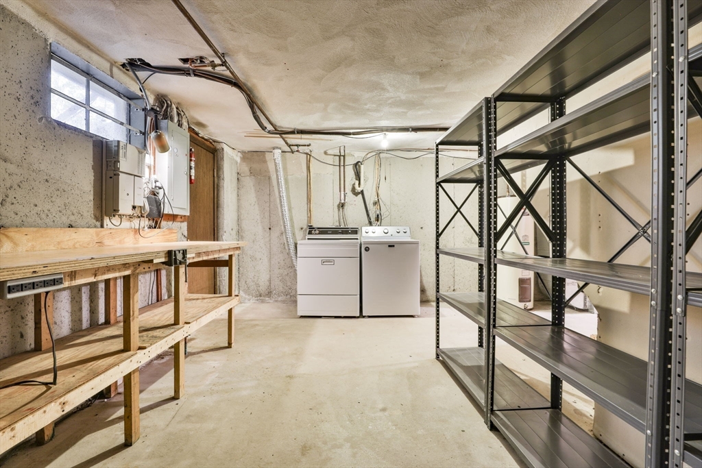 101 Drummer Road, Unit 101 Acton, MA 01720 - Photo 28 of 31 a view of a chairs with table and chairs