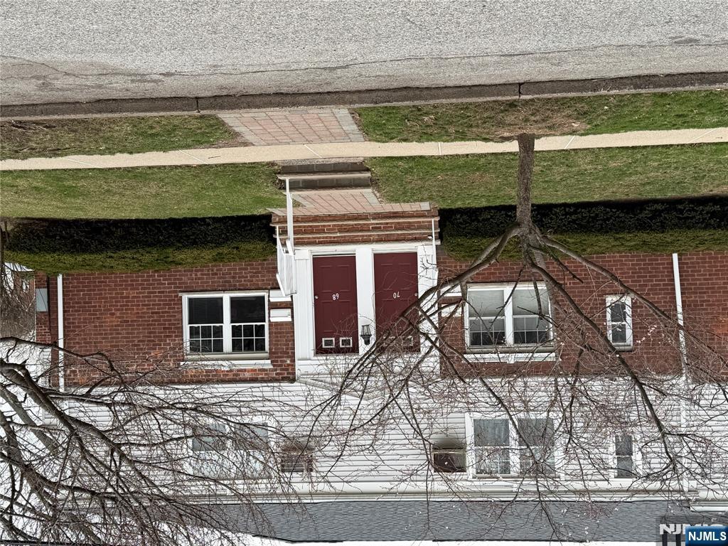 68 Hastings Avenue, Unit B Rutherford, NJ 07070 - Photo 2 of 3 front view of a house with a small yard