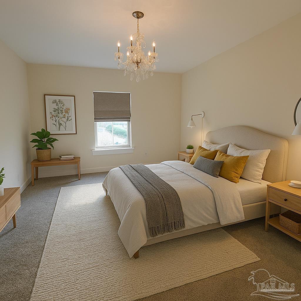 5642 Dunbar Circle Milton, FL 32583 - Photo 19 of 33 a bedroom with a bed and window