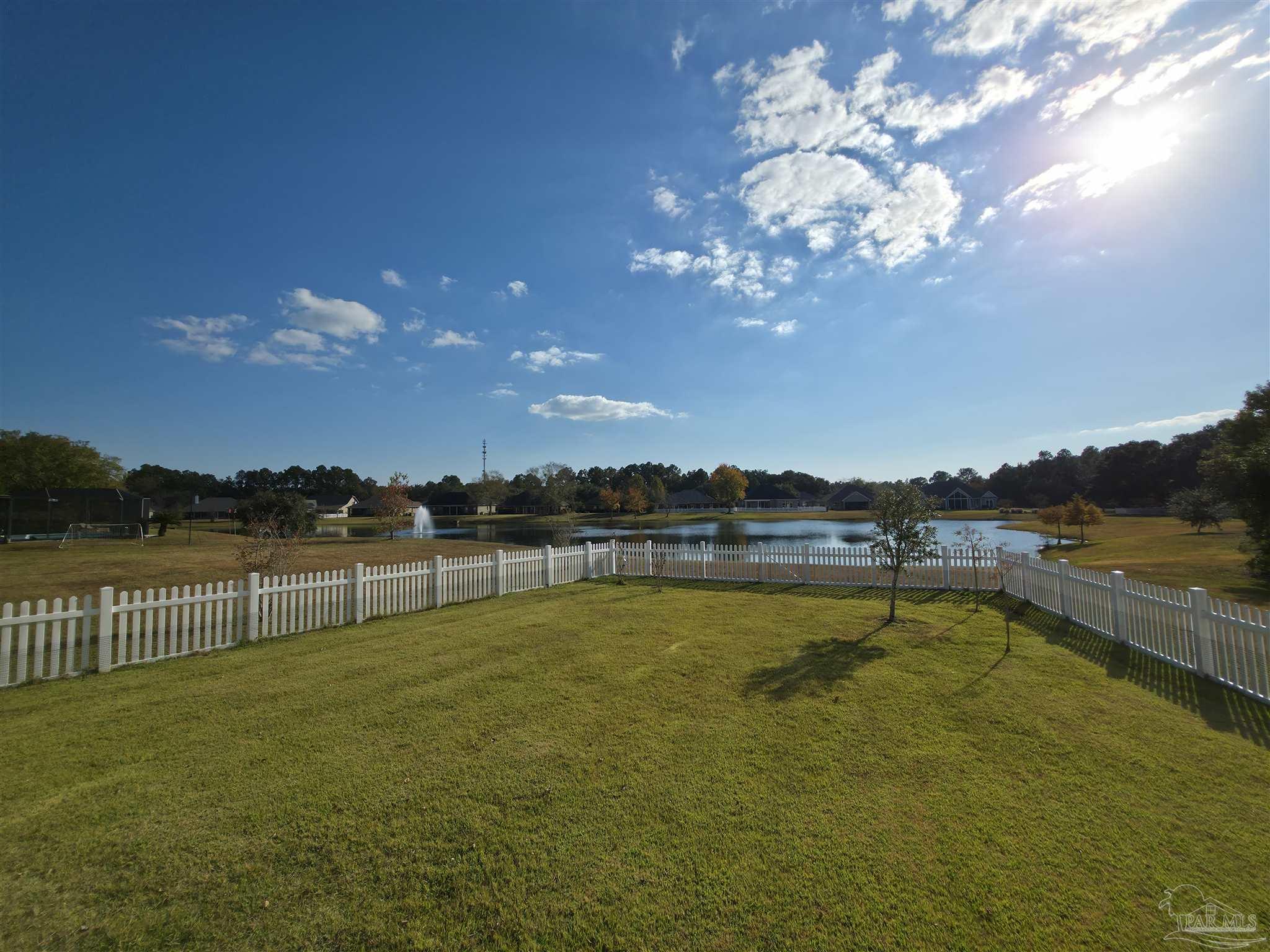 5642 Dunbar Circle Milton, FL 32583 - Photo 5 of 33 a view of a lake with a mountain