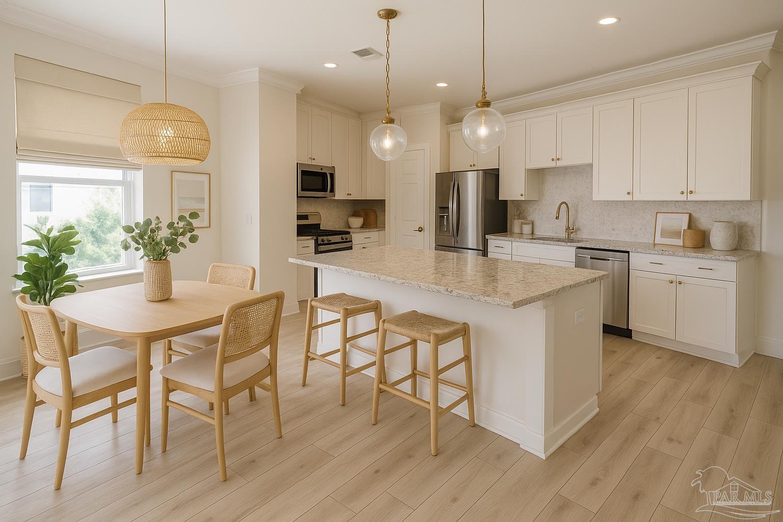 5642 Dunbar Circle Milton, FL 32583 - Photo 9 of 33 a kitchen with stainless steel appliances granite countertop a stove a refrigerator a kitchen island a dining table and chairs with wooden floor