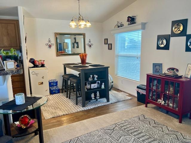 1650 Villa Avenue, Unit 9 Clovis, CA 93612 - Photo 11 of 29 a view of a dining room with furniture and chandelier