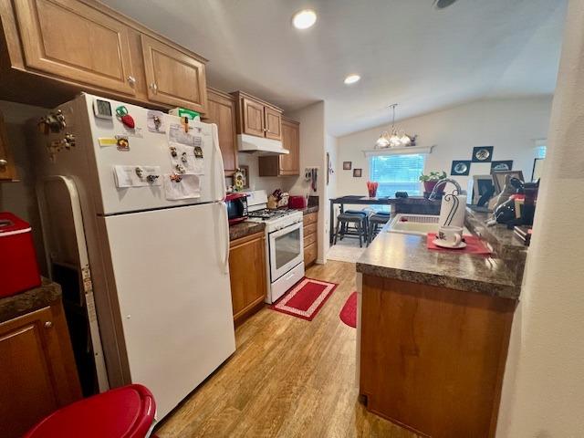 1650 Villa Avenue, Unit 9 Clovis, CA 93612 - Photo 17 of 29 a kitchen with refrigerator a stove a sink and a refrigerator