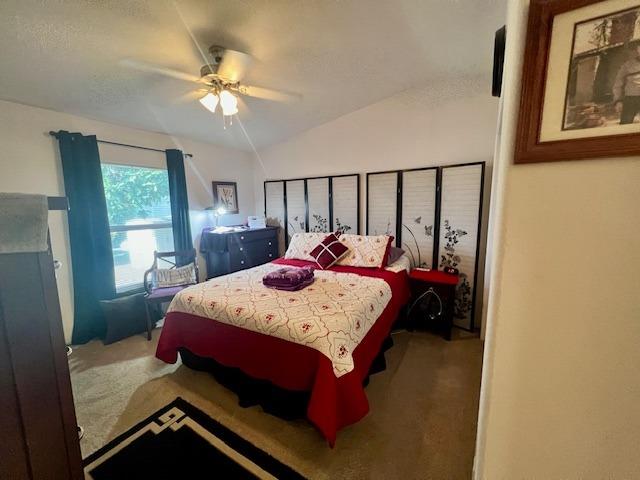 1650 Villa Avenue, Unit 9 Clovis, CA 93612 - Photo 19 of 29 a bed sitting in a bedroom next to a window