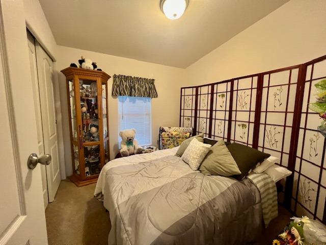 1650 Villa Avenue, Unit 9 Clovis, CA 93612 - Photo 21 of 29 a bed sitting in a bedroom next to a window