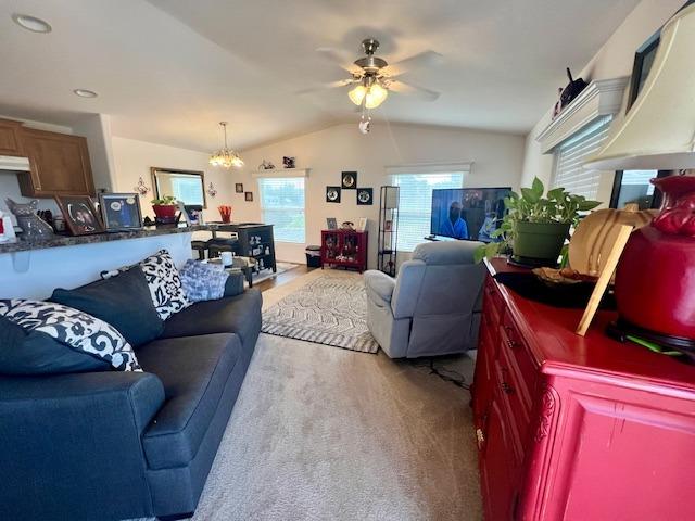 1650 Villa Avenue, Unit 9 Clovis, CA 93612 - Photo 7 of 29 a living room with furniture fireplace and a chandelier