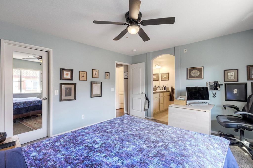 40238 Rosewell Court Temecula, CA 92591 - Photo 27 of 38 a bedroom with a bed and a view of bedroom