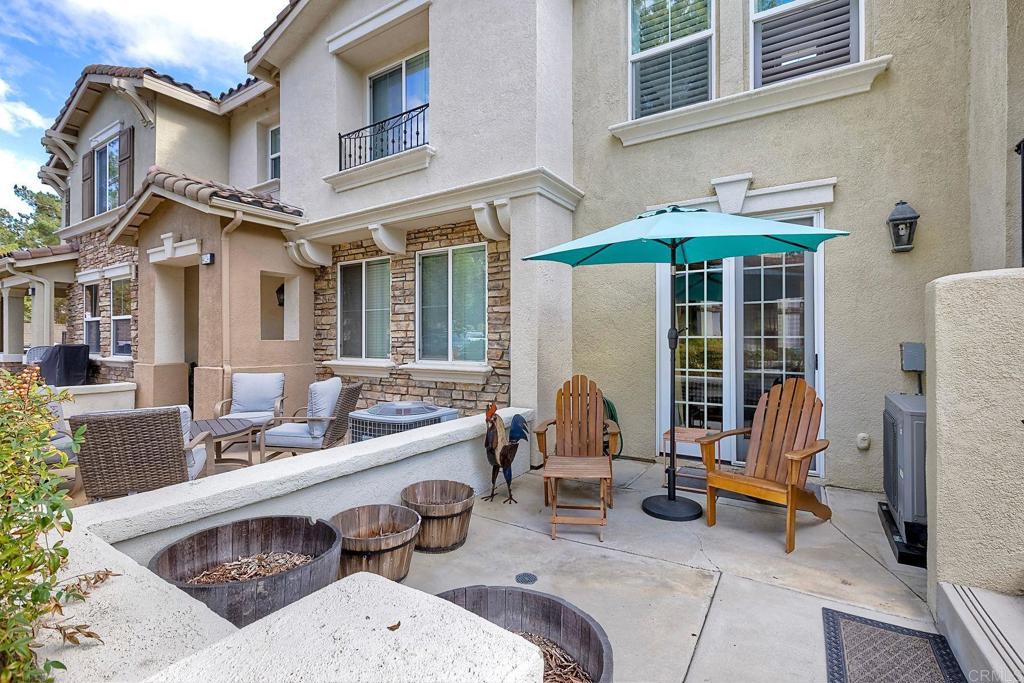 40238 Rosewell Court Temecula, CA 92591 - Photo 5 of 38 a view of a patio with a table and chairs