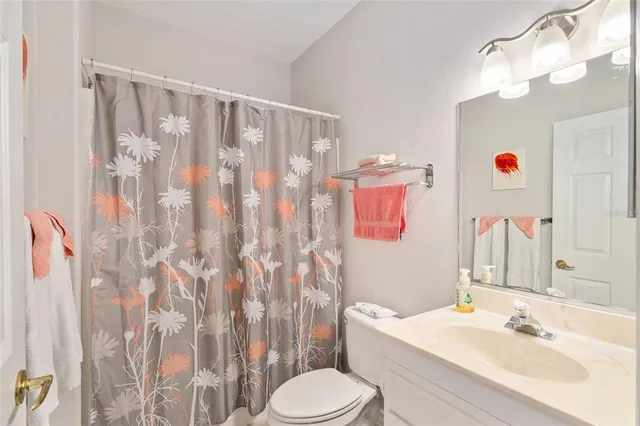 a view of a kitchen cabinets and wooden floor