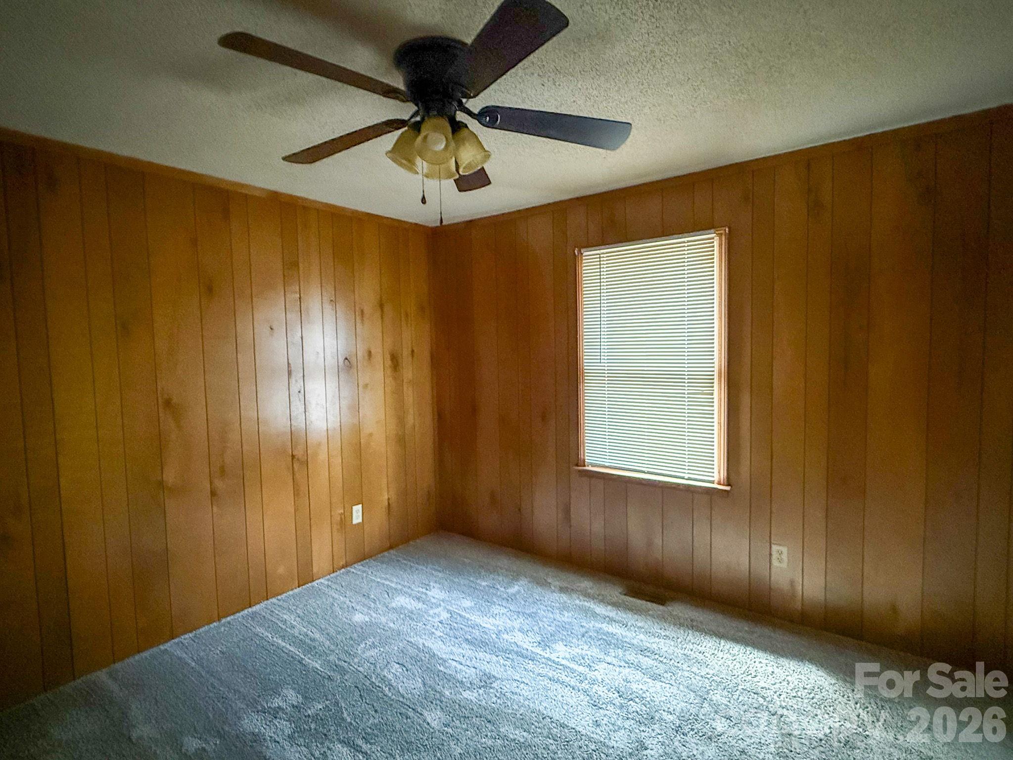 4562 Grassy Creek Road Denver, NC 28037 - Photo 13 of 24 a view of an empty room and chandelier fan