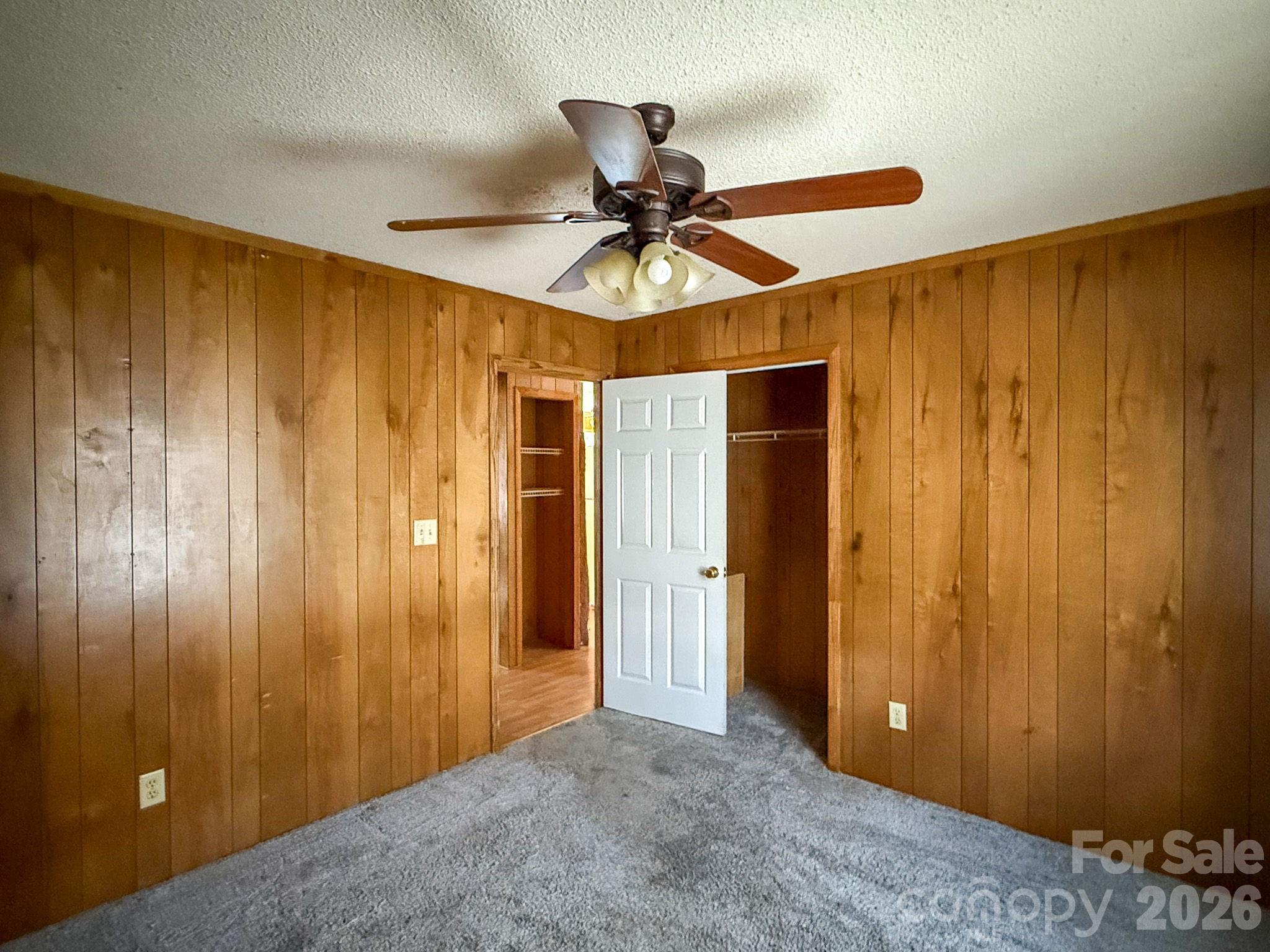 4562 Grassy Creek Road Denver, NC 28037 - Photo 16 of 24 a view of a livingroom with a chandelier fan