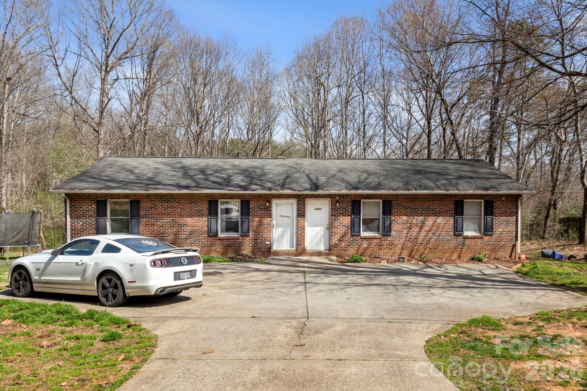 4562 Grassy Creek Road Denver, NC 28037 - Photo 2 of 24 a house view with a outdoor space