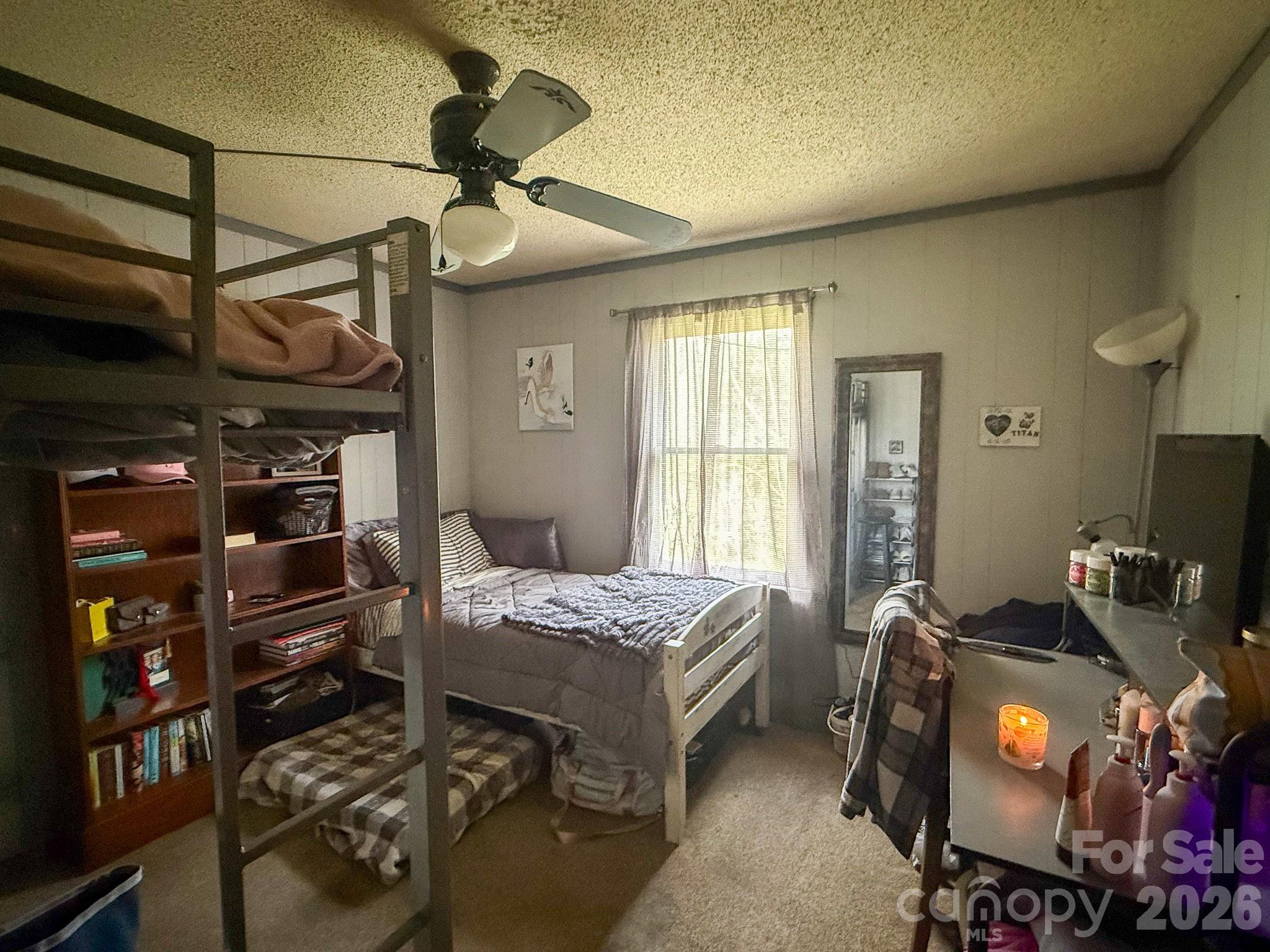 4562 Grassy Creek Road Denver, NC 28037 - Photo 23 of 24 a bedroom with a bed and a closet