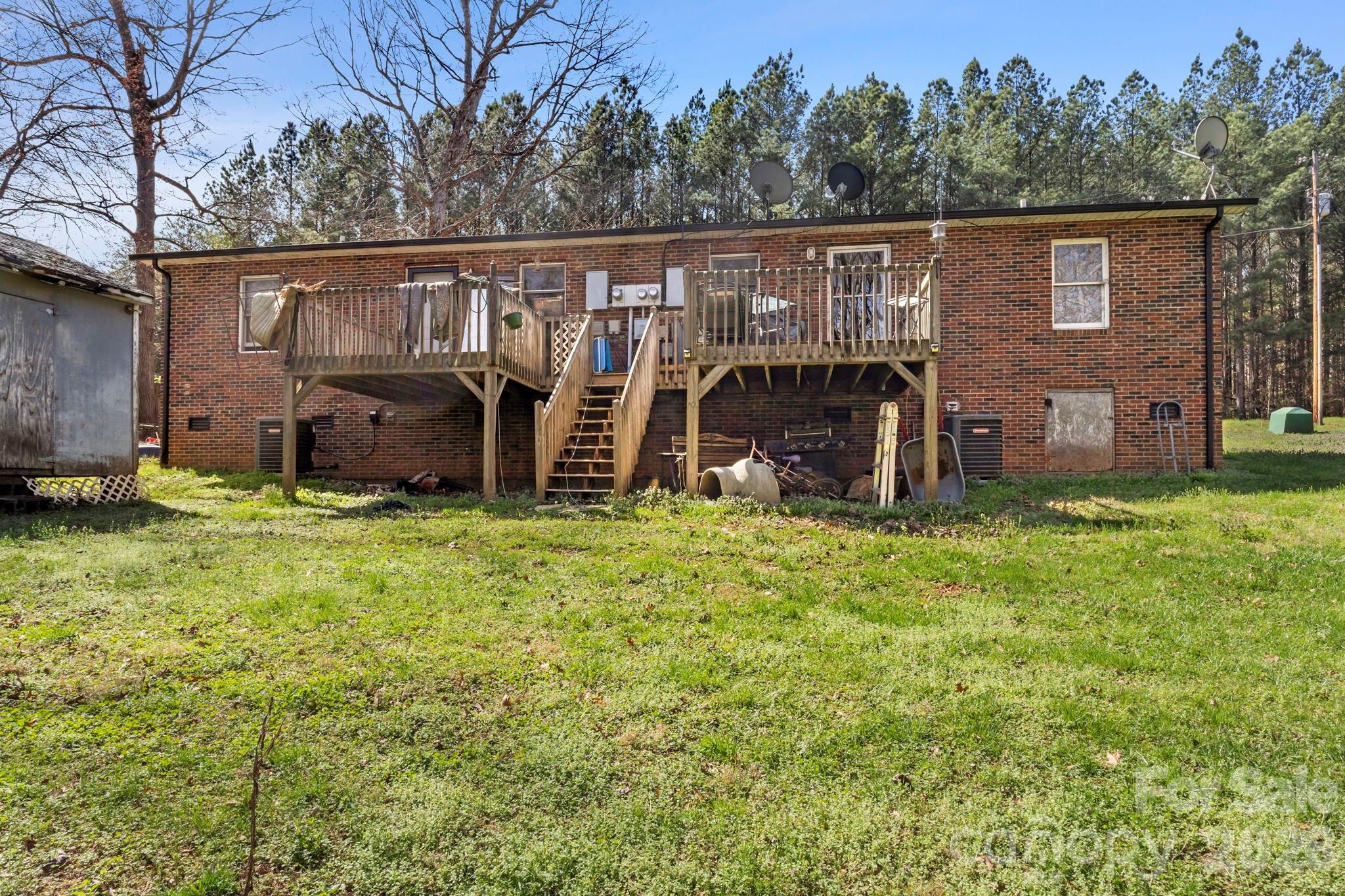 4562 Grassy Creek Road Denver, NC 28037 - Photo 8 of 24 a view of house with backyard outdoor seating and hardwood