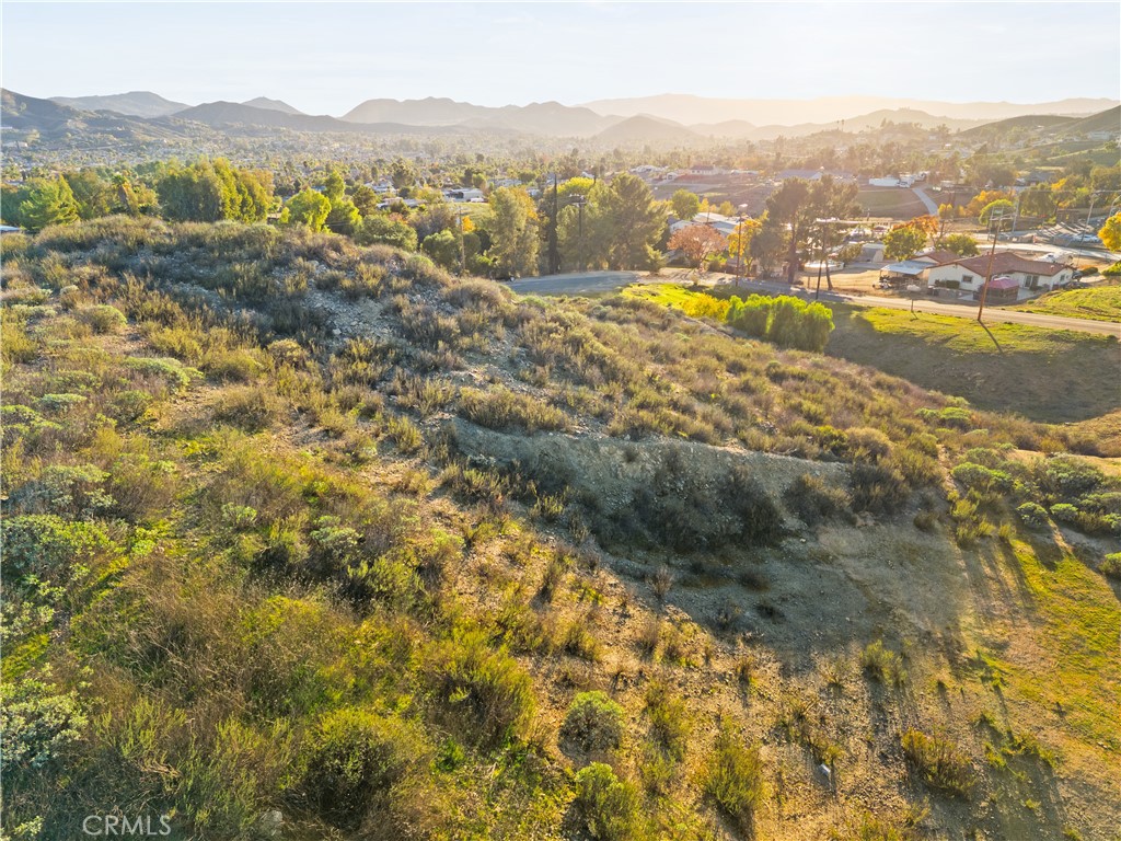 23930 Beverly Drive Menifee, CA 92587 - Photo 12 of 18 a view of a lake with mountains in the background