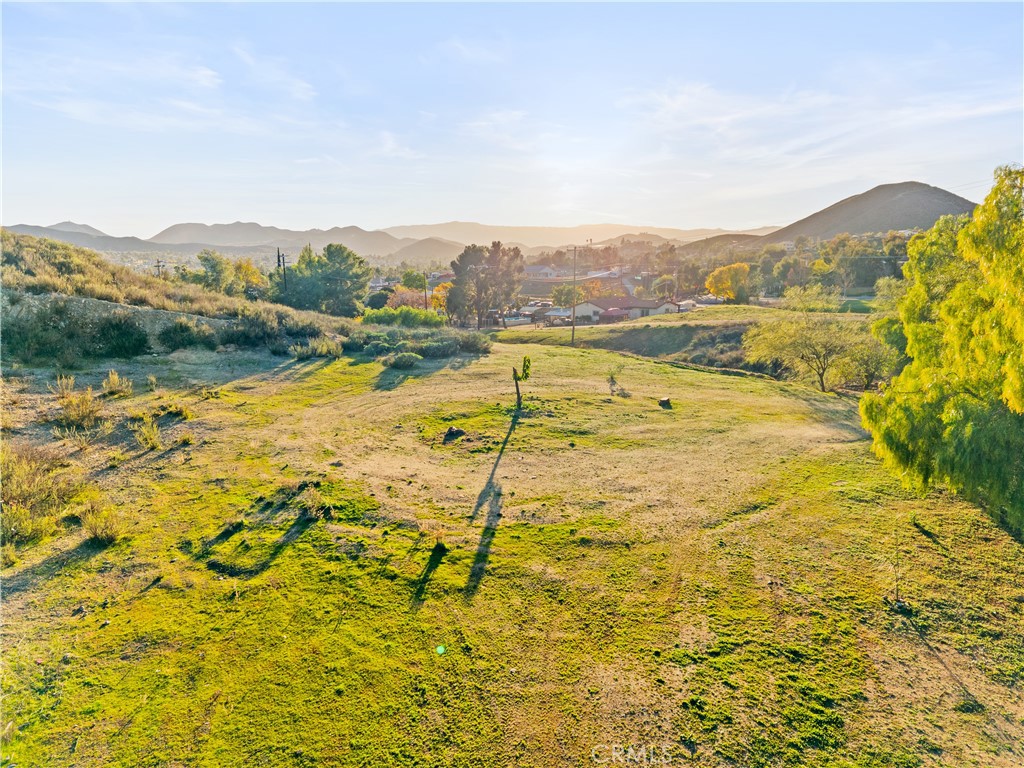 23930 Beverly Drive Menifee, CA 92587 - Photo 5 of 18 a view of an aerial view of residential houses with swimming pool