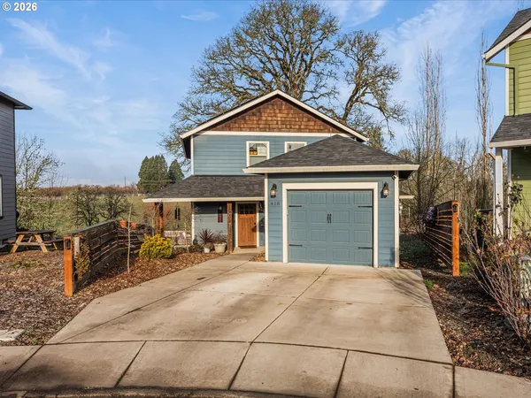 a front view of a house with yard