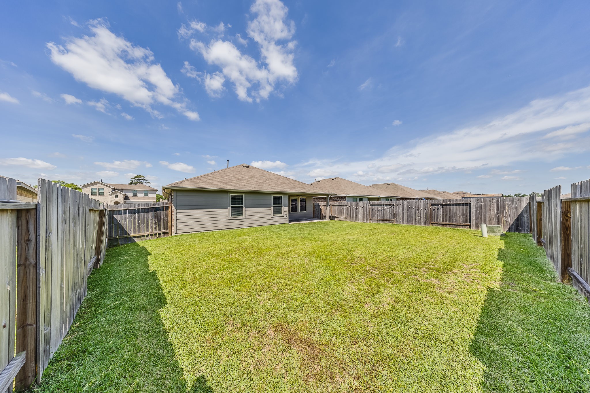 23210 Barberry Crk Trail Spring, TX 77373 - Photo 21 of 33 a swimming pool with outdoor seating
