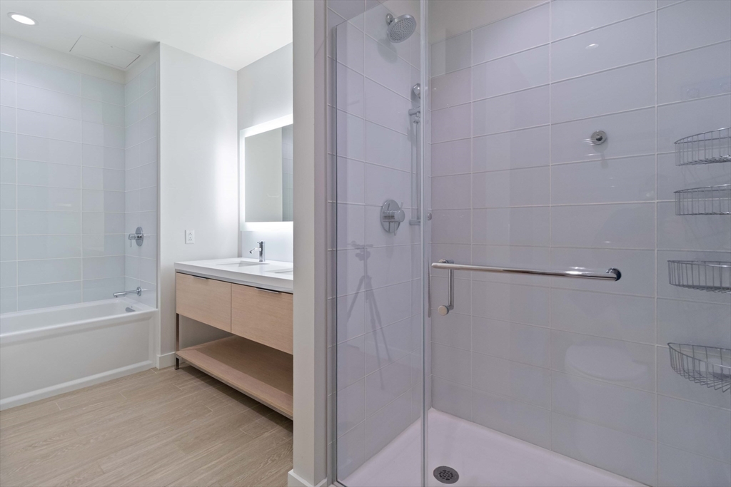 188 Brookline Avenue, Unit 20J Boston, MA 02215 - Photo 11 of 29 a bathroom with a bathtub and a shower
