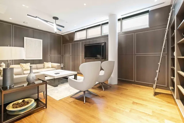 a living room with patio furniture