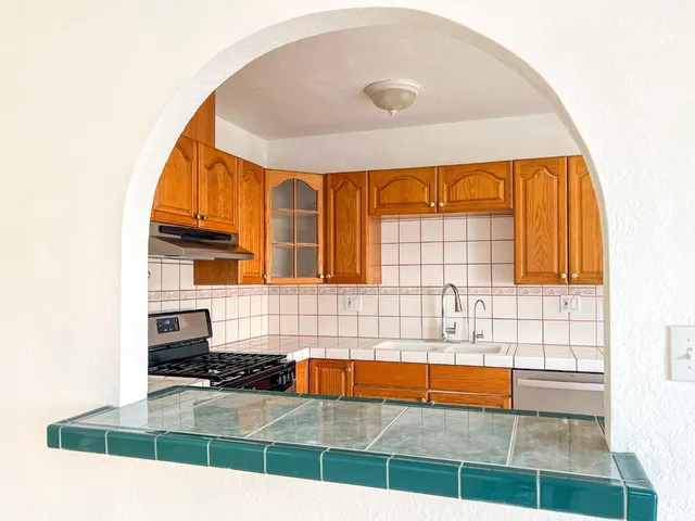 a bathroom with a shower and toilet