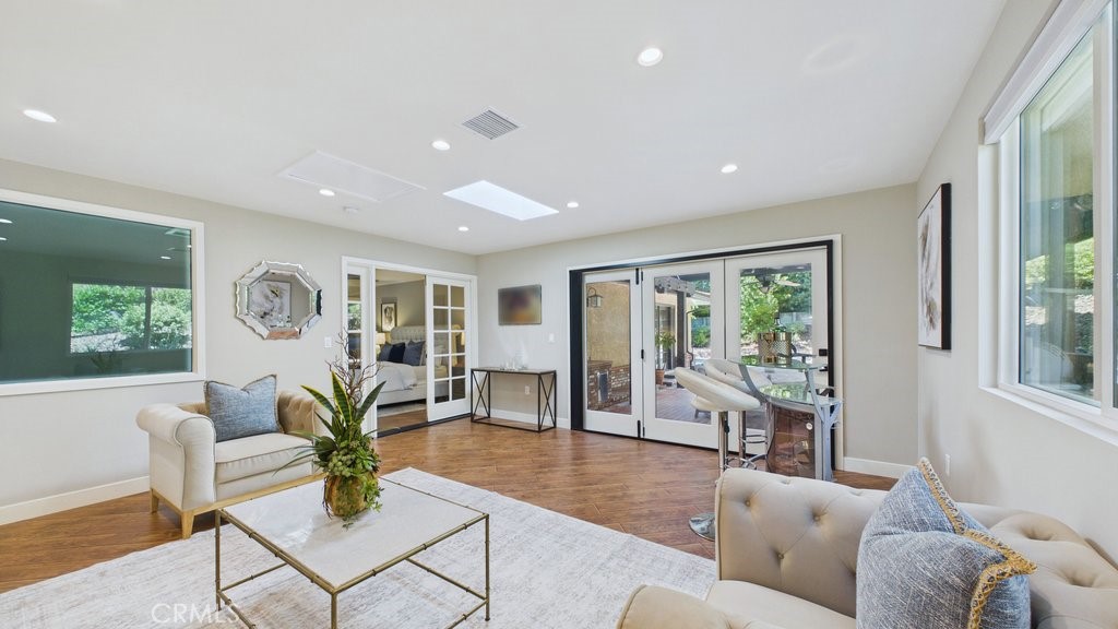 340 Toyon Road Sierra Madre, CA 91024 - Photo 42 of 60 View of family area that overlooks the patio and pool with easy access to the primary bedroom on the Left.
