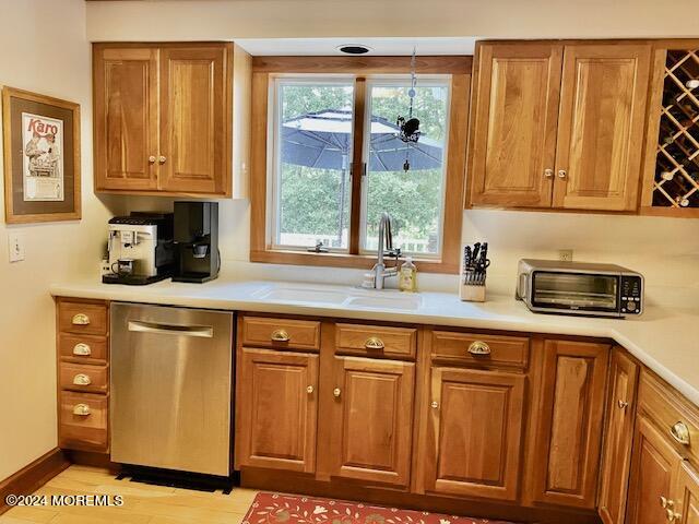 732 Radcliffe Road Lanoka Harbor, NJ 08734 - Photo 12 of 67 a kitchen with stainless steel appliances granite countertop a sink and cabinets