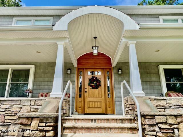 732 Radcliffe Road Lanoka Harbor, NJ 08734 - Photo 5 of 67 a view of entryway and hall with wooden floor