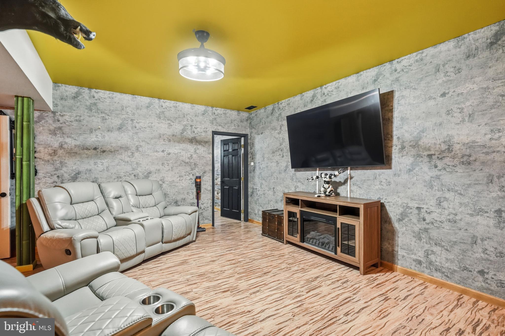 705 Garden Road Pittsgrove, NJ 08318 - Photo 44 of 72 a living room with furniture and a flat screen tv