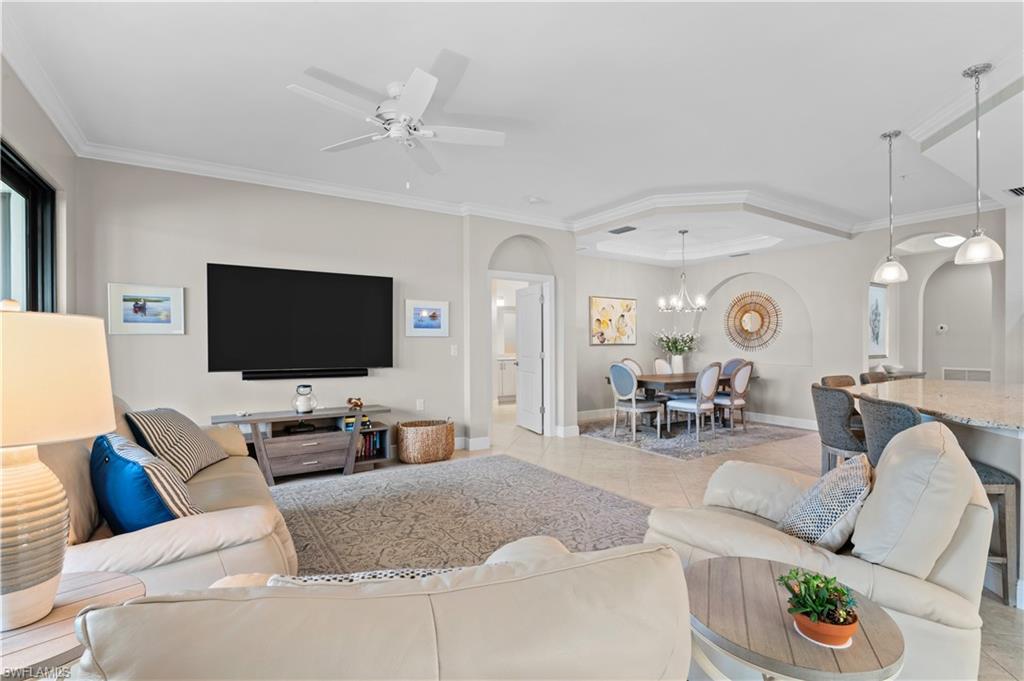 10470 Casella Way, Unit 101 Fort Myers, FL 33913 - Photo 12 of 20 a living room with furniture and a flat screen tv