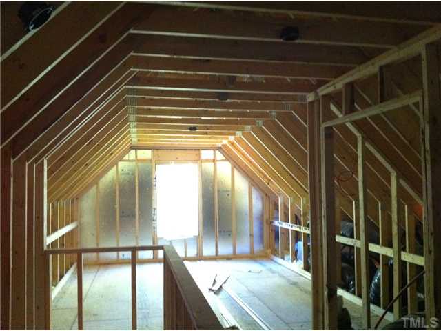 5801 Abbington Way Raleigh, NC 27610 - Photo 9 of 10 Unfinished walk up attic makes great storage or future expansion opportunity!