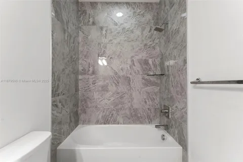 a bathroom with a bathtub