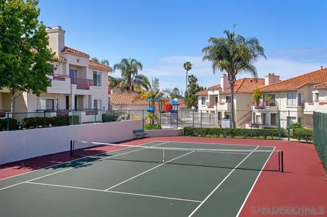 a view of swimming pool from a balcony