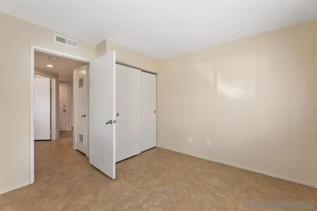 a view of a room that has a window in it