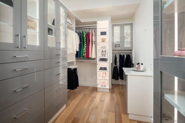 a kitchen with a refrigerator and window