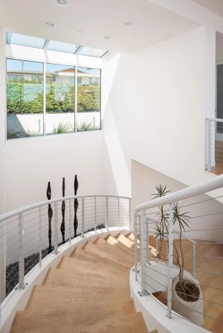 a bed room with a bed and a mirror