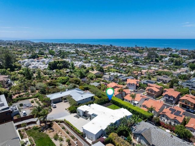 an aerial view of a city with lots of residential buildings