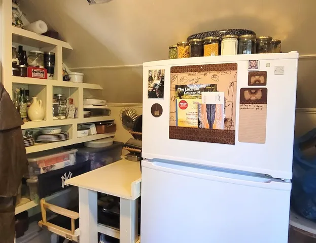 a kitchen with a stove and cabinets