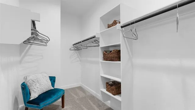 a bathroom with a double vanity sink and shower