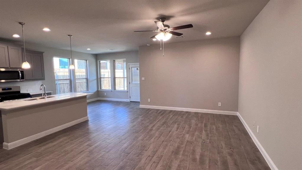 129 Medina Lane Rhome, TX 76078 - Photo 2 of 13 a view of kitchen and window