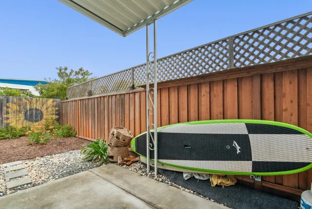 an aerial view of residential building and ocean
