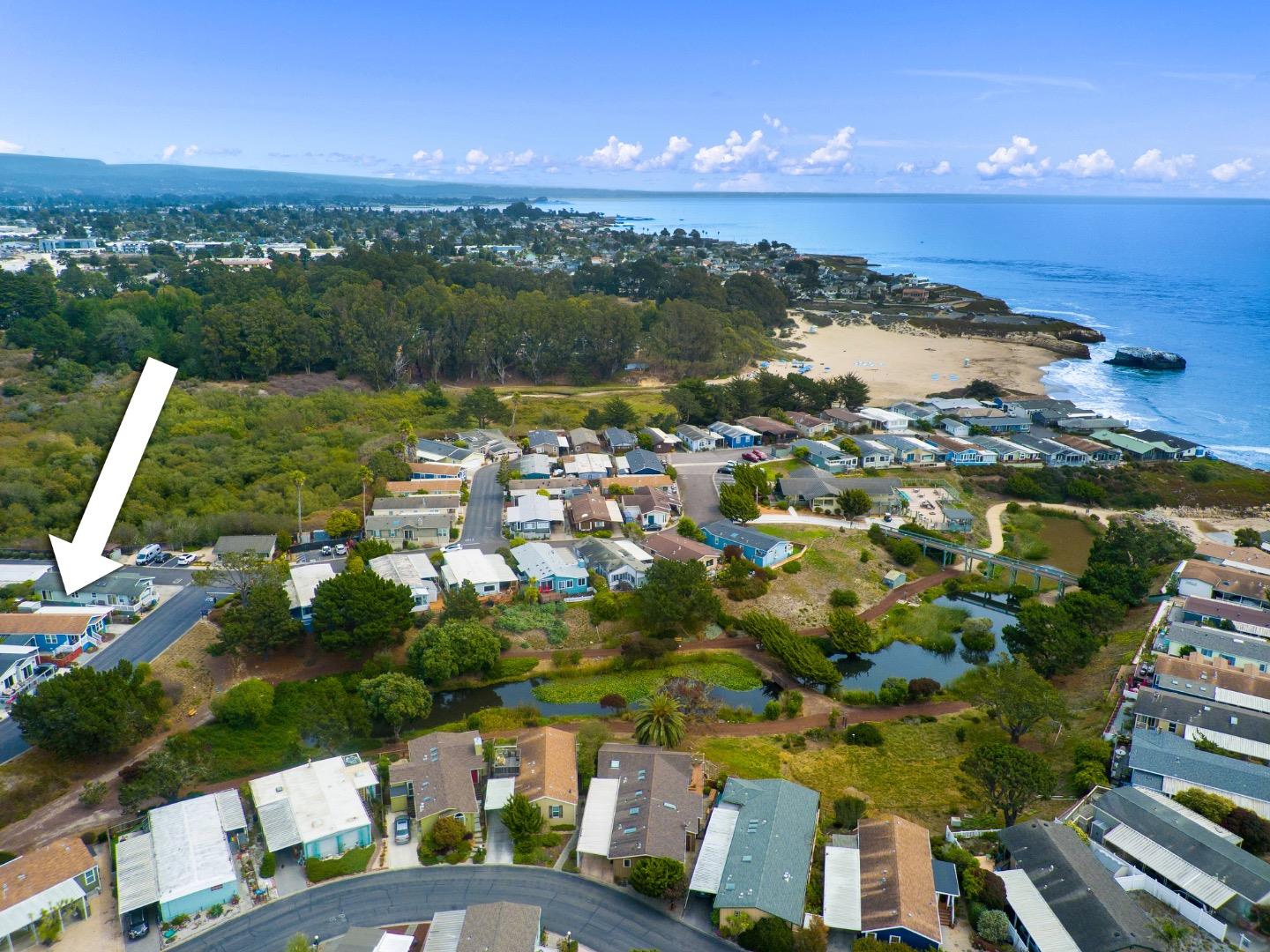 2395 Delaware Avenue, Unit 88 Santa Cruz, CA 95060 - Photo 41 of 55 an aerial view of a city with lots of residential buildings ocean and mountain view in back