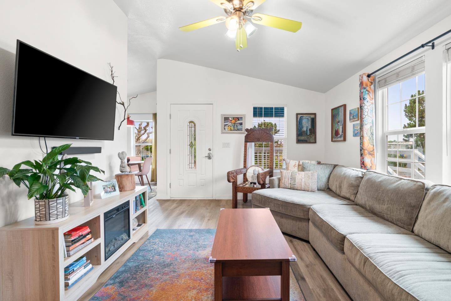 2395 Delaware Avenue, Unit 88 Santa Cruz, CA 95060 - Photo 5 of 55 a living room with furniture and a flat screen tv