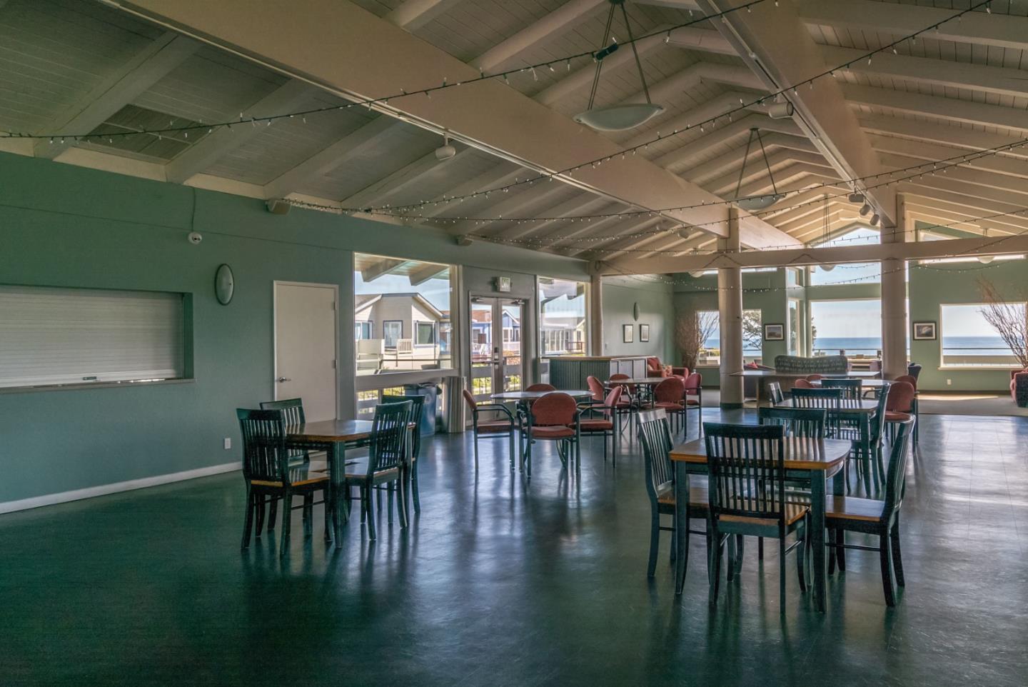 2395 Delaware Avenue, Unit 88 Santa Cruz, CA 95060 - Photo 51 of 55 a dining room with furniture window and wooden floor