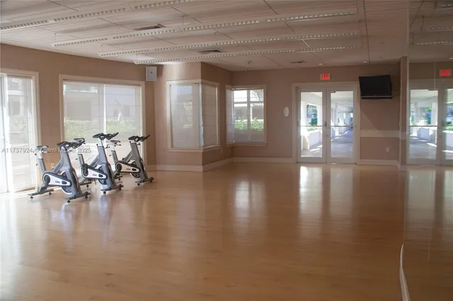 a view of a livingroom with wooden floor