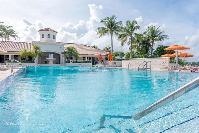a front view of house with yard and patio