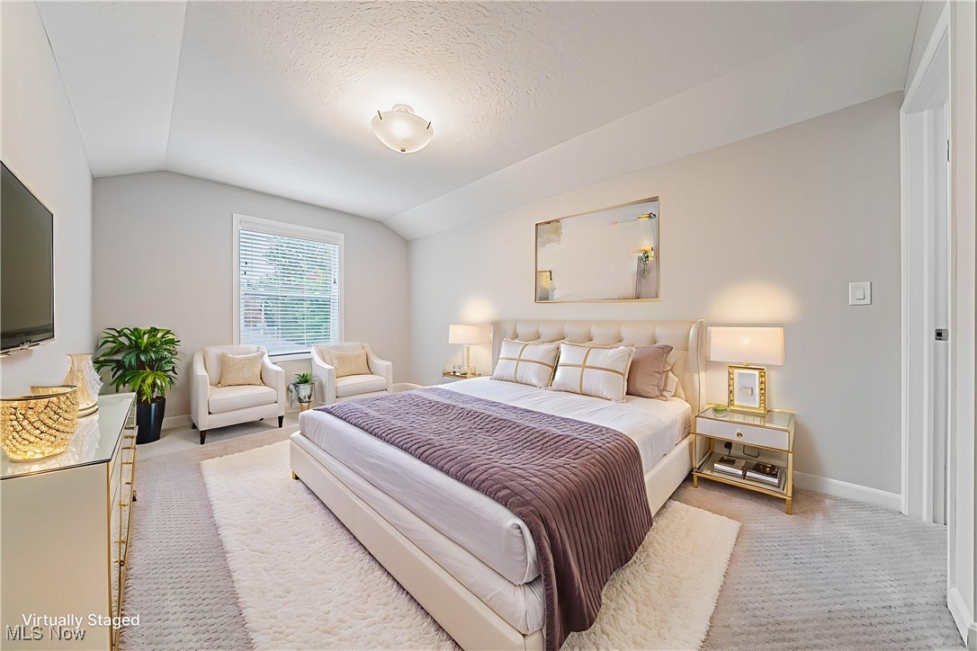5270 Brainard Road Solon, OH 44139 - Photo 19 of 45 Virtually Staged-Bedroom #2 with light colored carpet, vaulted ceiling, and a textured ceiling
